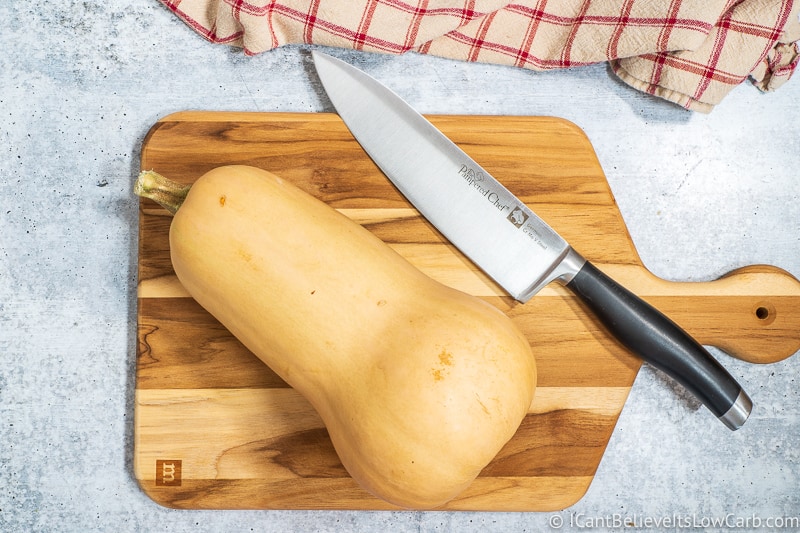 Butternut Squash and knife on cutting board