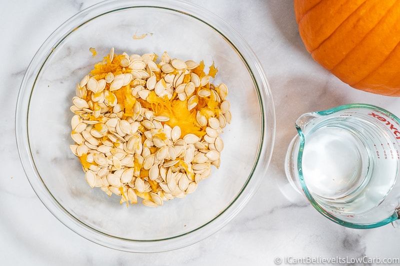 Pumpkin Seeds in bowl before cleaning them