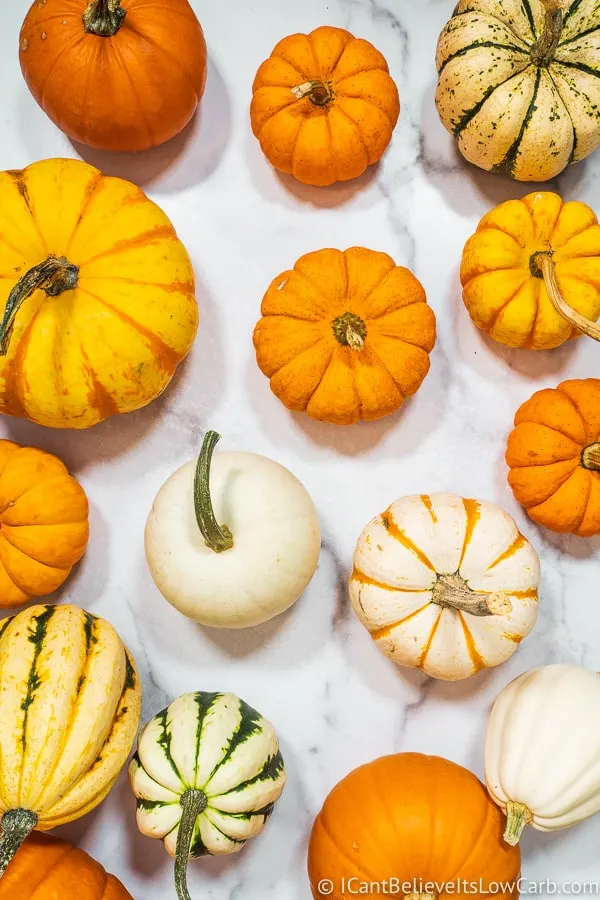 Many Pumpkins on a white table