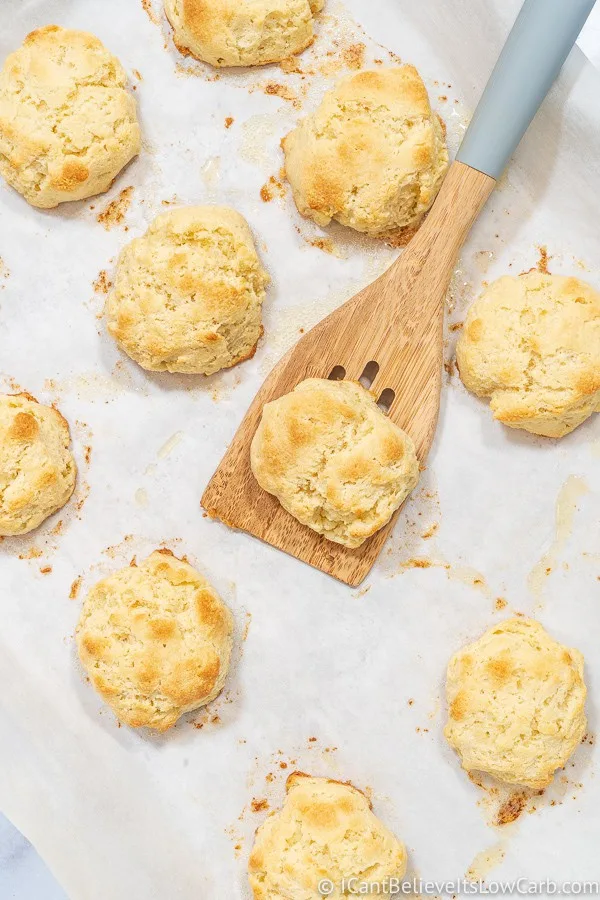 Keto Biscuits on a tray with a spatula