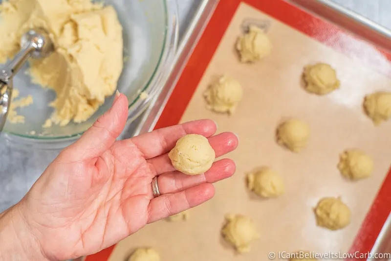 Rolling Keto Cream Cheese Cookie dough in ball