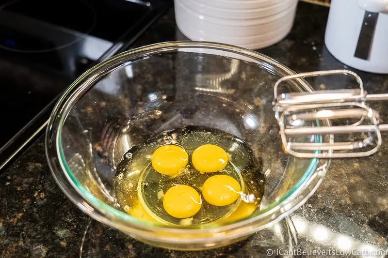 4 eggs in a bowl for custard