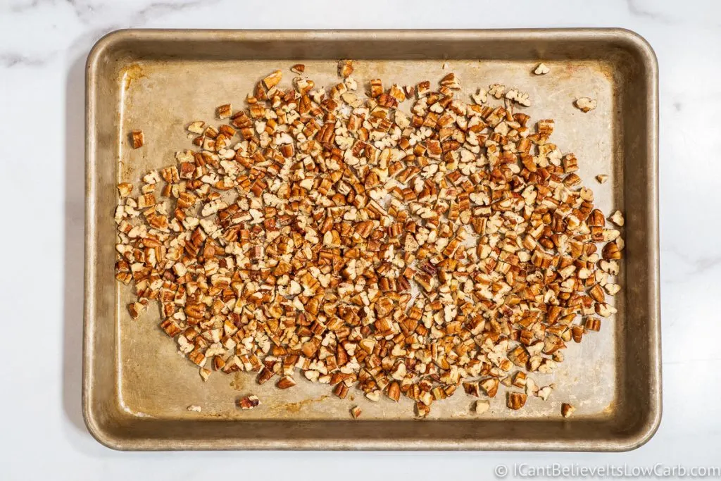 chopped pecans on a tray