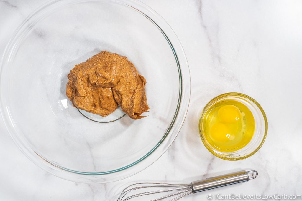 almond butter in a glass bowl and eggs