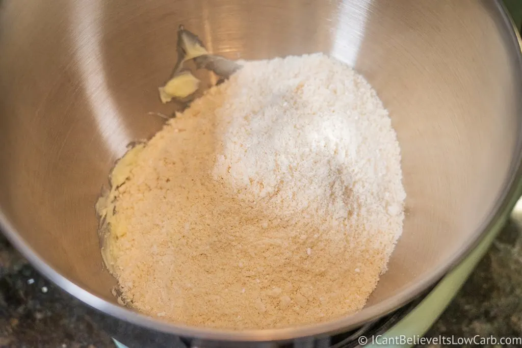 adding almond flour mixture to butter