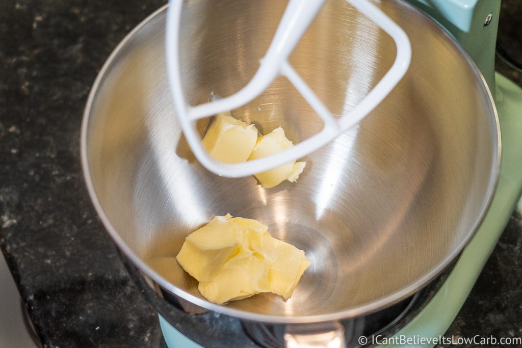 adding butter to mixer