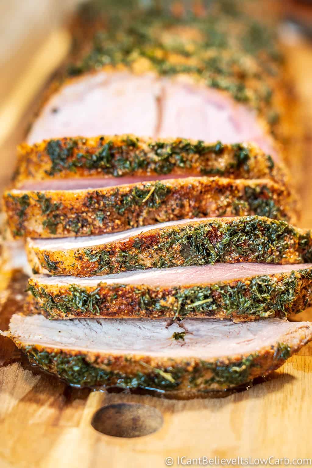 Pork Loin Roast seasoned and on cutting board