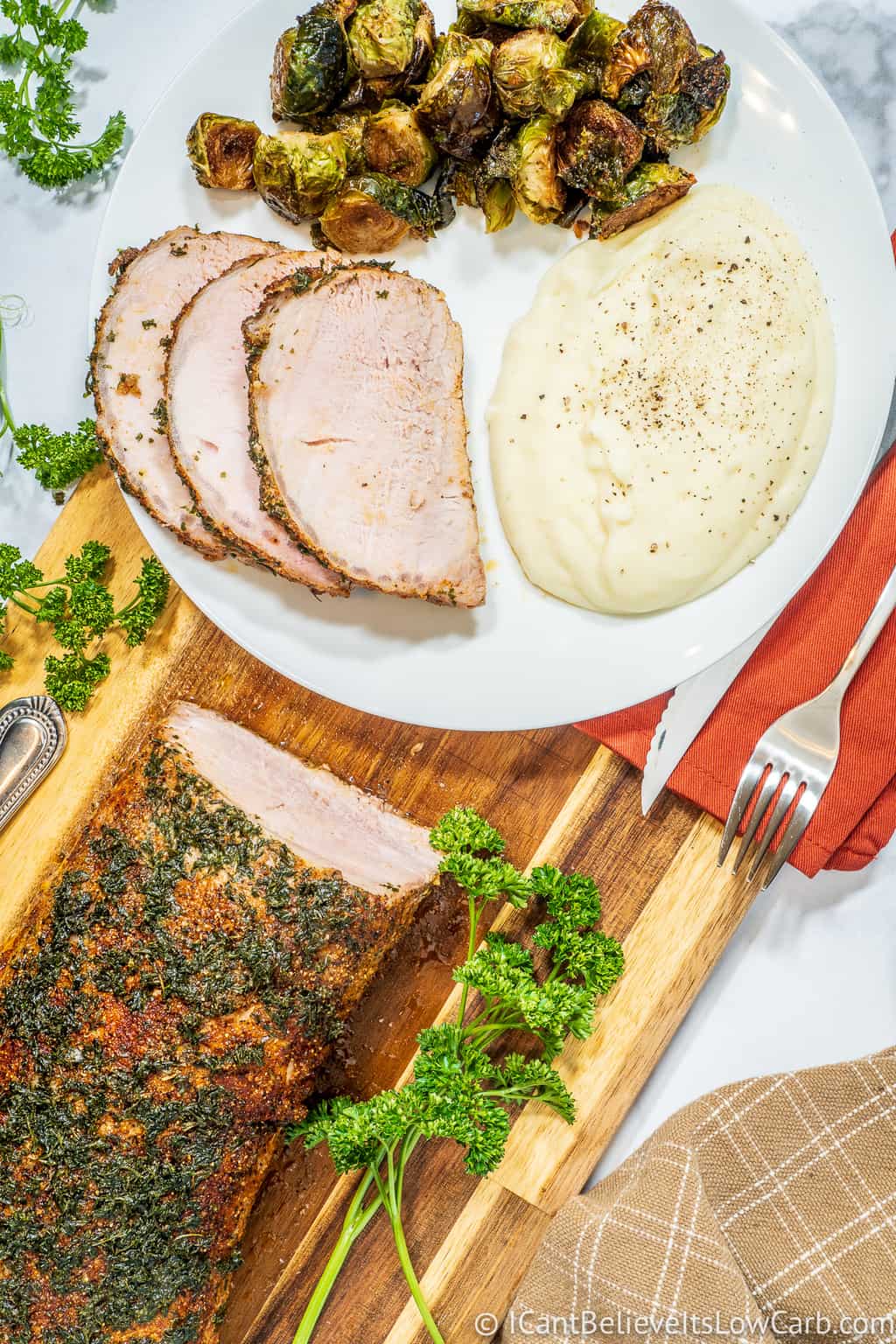 Pork Loin on a plate with cauliflower and brussel sprouts