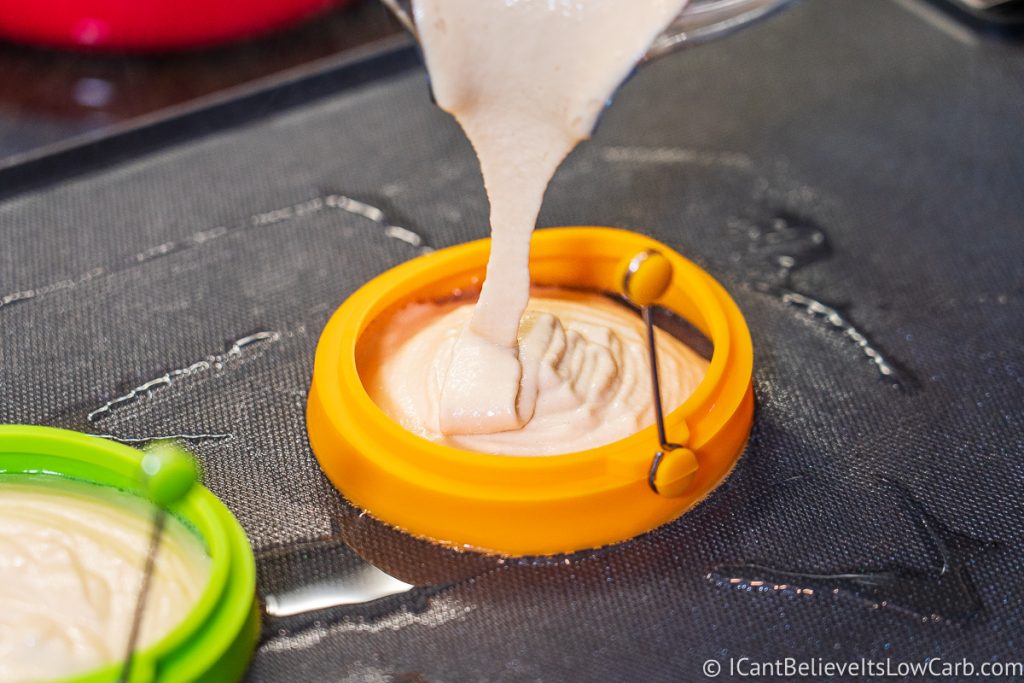Pouring Almond Flour Pancake batter into molds