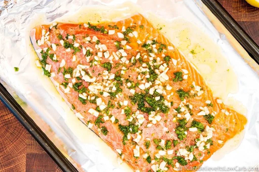 Salmon with lemon oil sauce before putting in the oven
