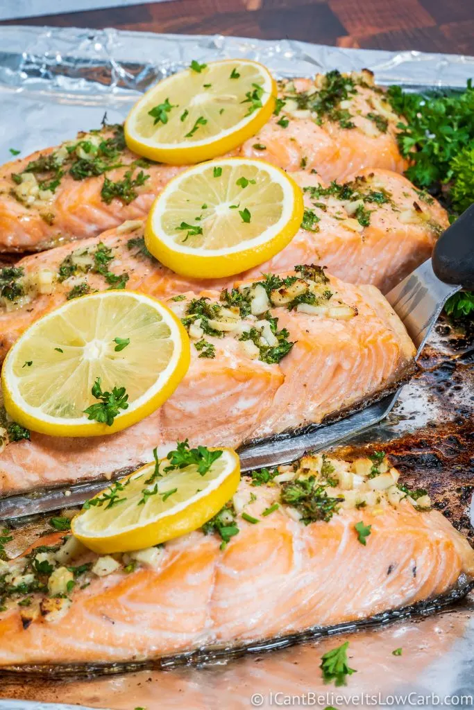 Picking up Baked Salmon filet with spatula