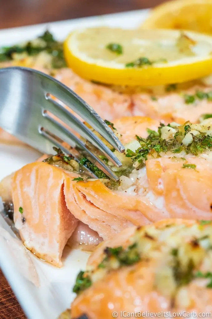 Cutting into Baked Salmon with a fork
