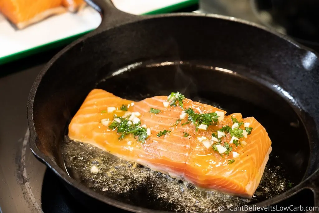 Searing Salmon filet in a cast iron pan