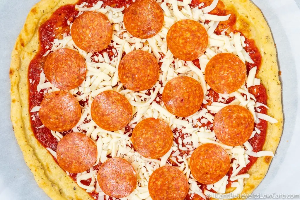 adding pepperoni slices on top