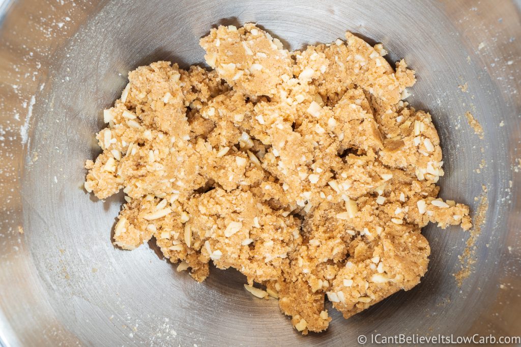 Mixing slivered almonds into cookie dough