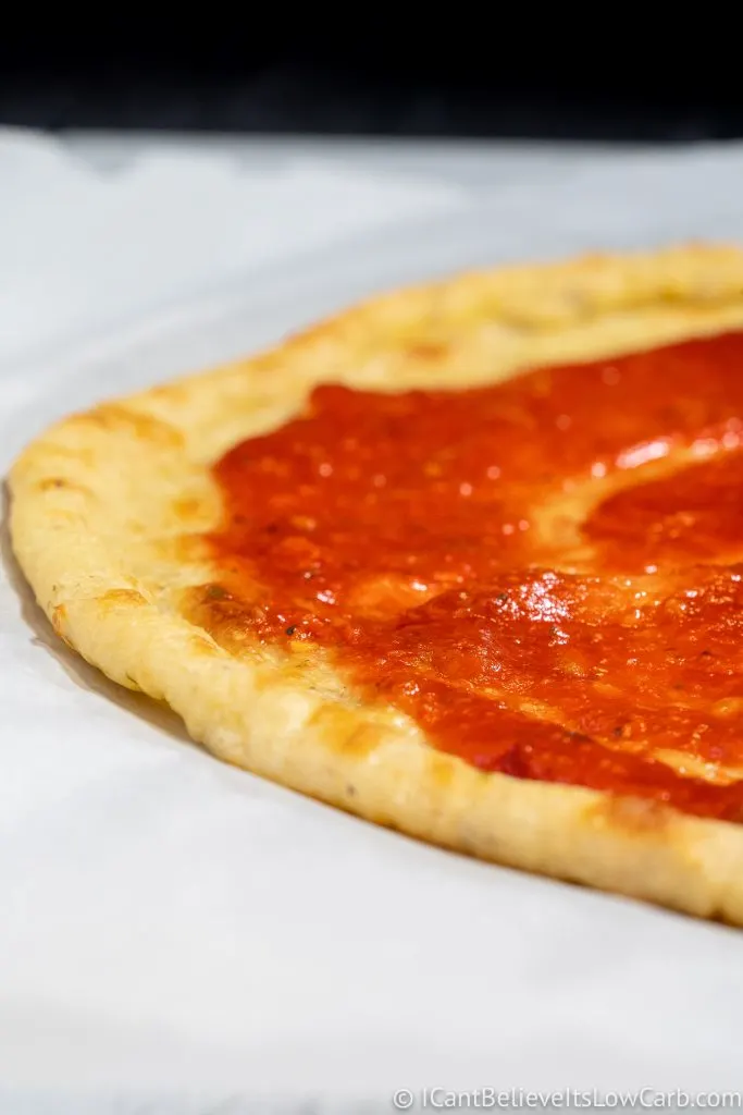 Low Carb Keto Pizza Sauce on pizza crust