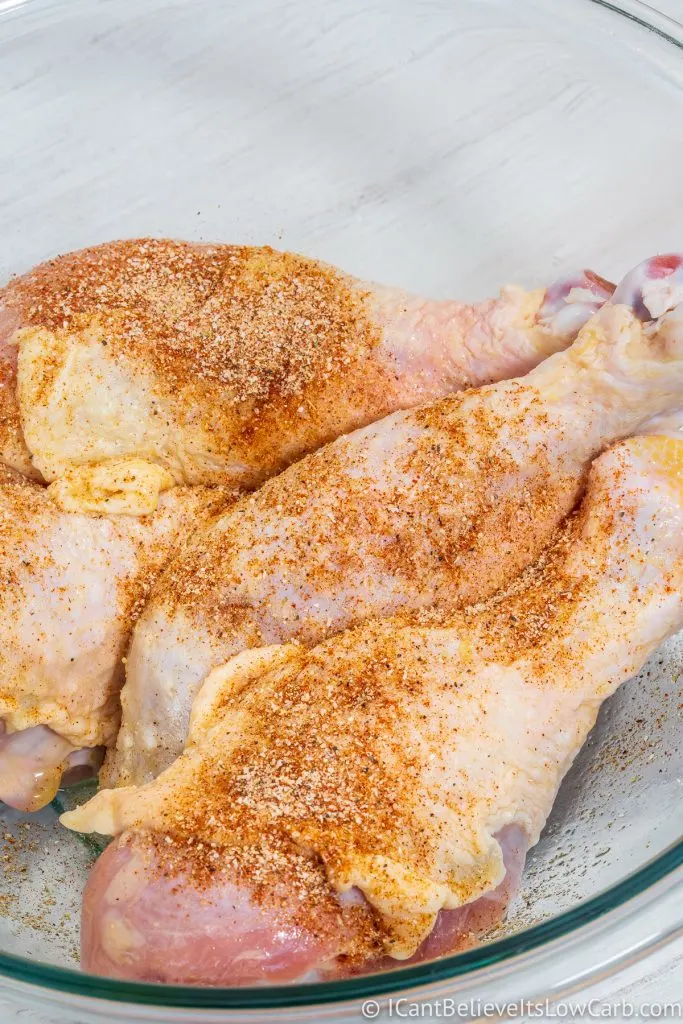 Raw Chicken Legs covered in spices