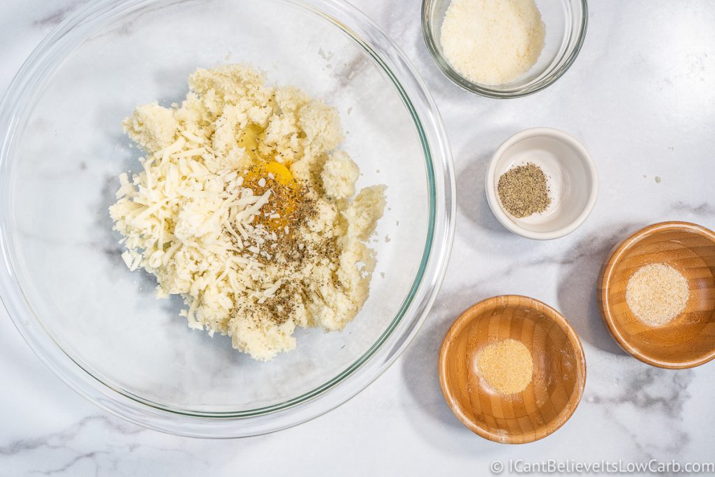 Ingredients for Cauliflower Pizza Crust in a bowl