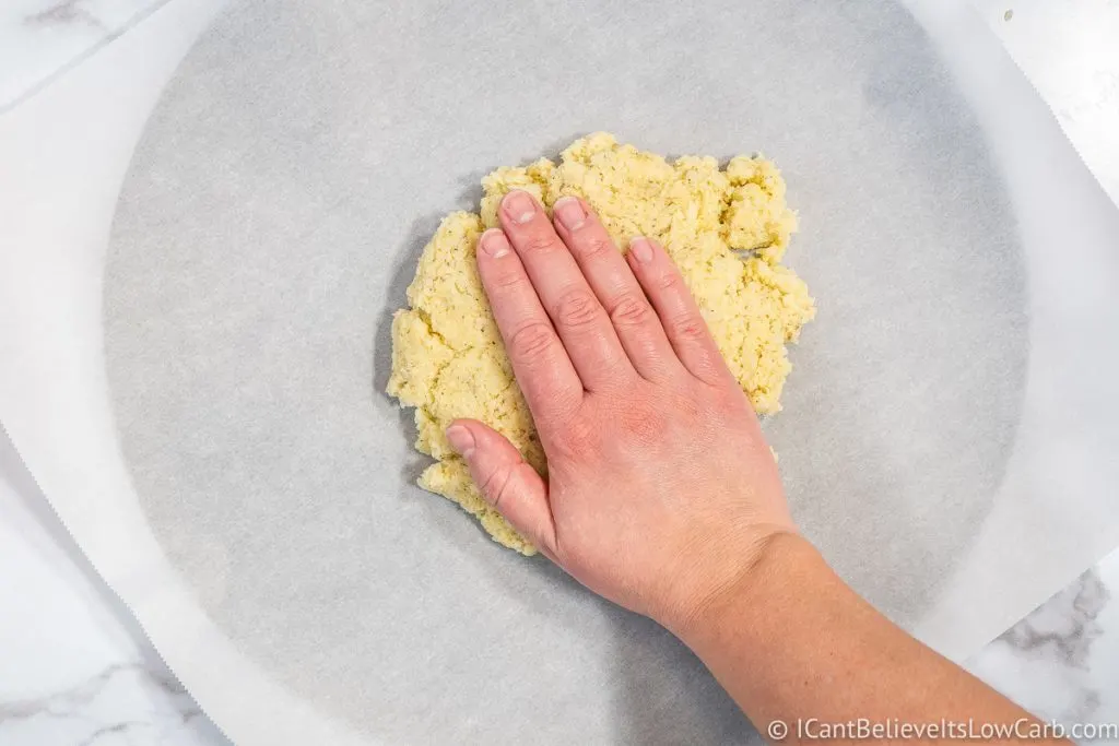 flattening Cauliflower Pizza dough