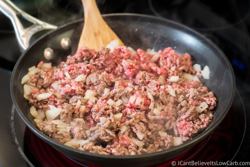 frying ground beef with onions and spices