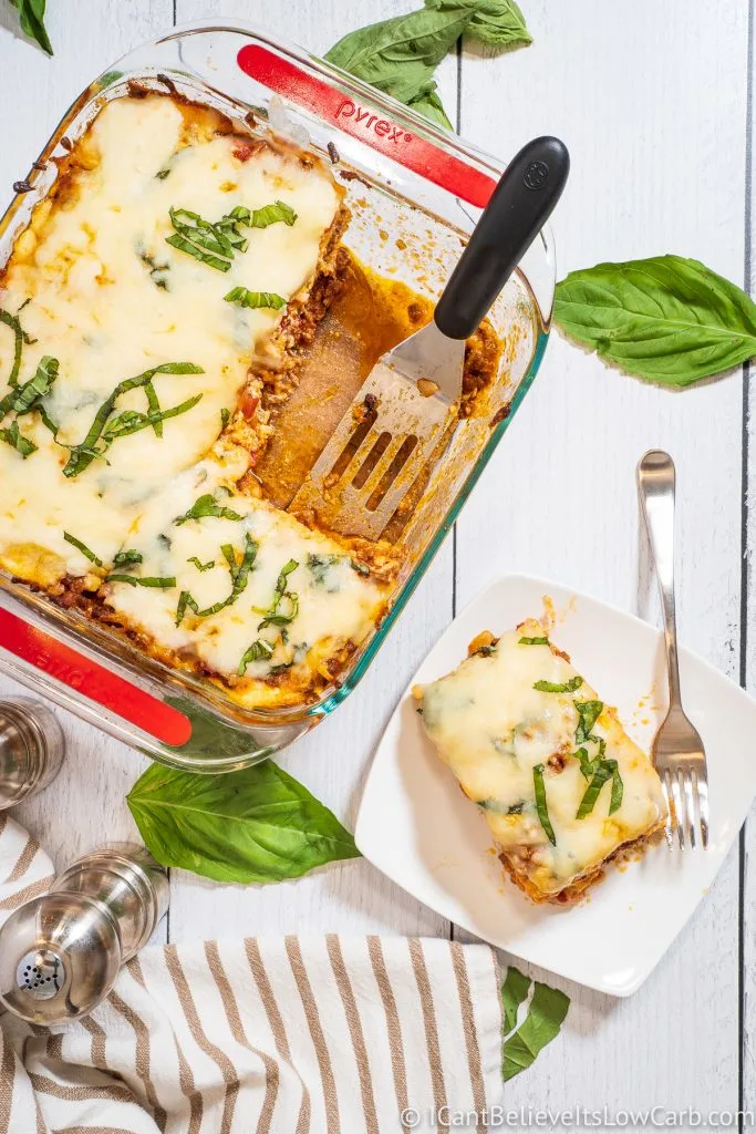 Pan of Keto Lasagna and a piece on a white plate