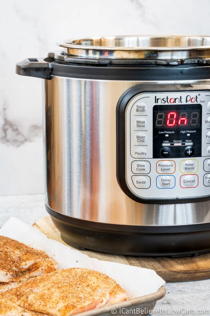 Instant Pot on the counter with Chicken Thighs