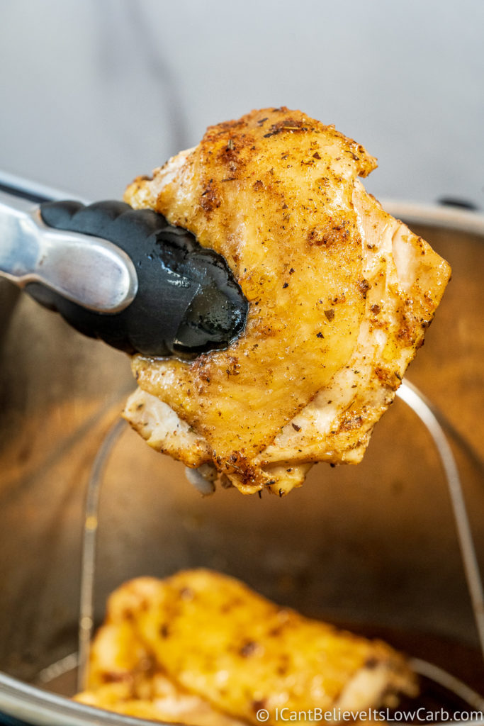 Taking out Chicken Thighs with tongs
