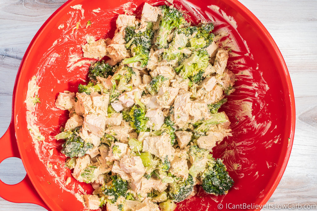 Mixing Chicken and broccoli with cream