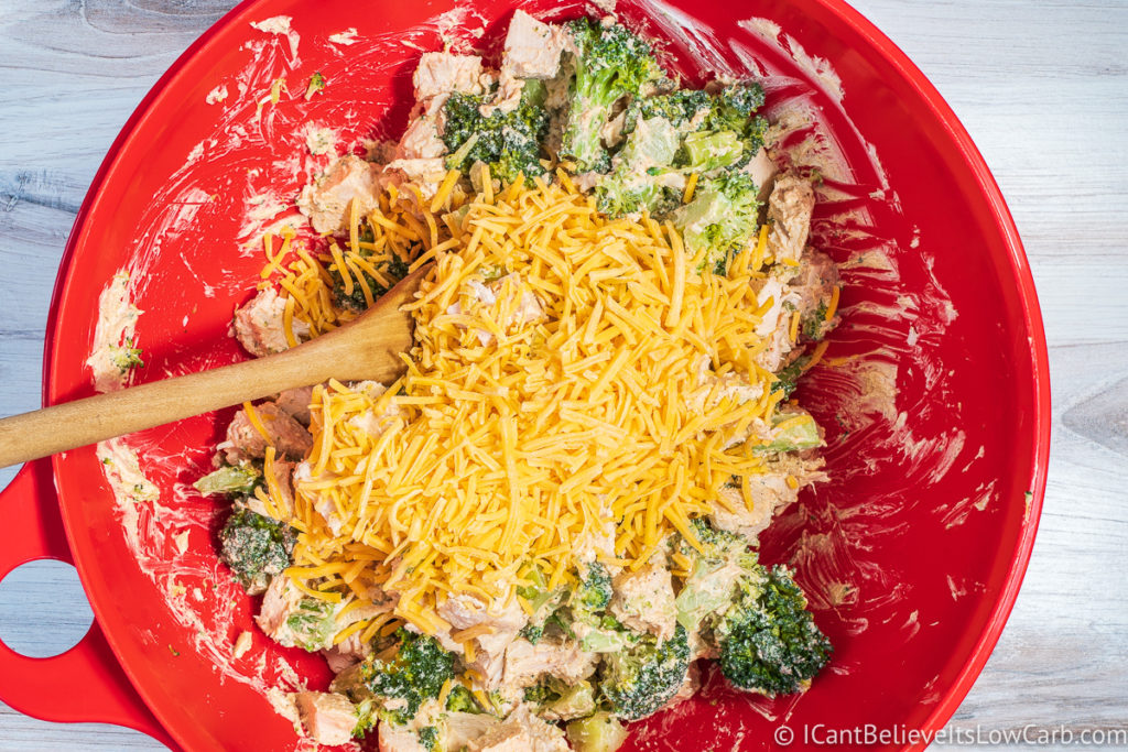 Mixing Chicken and broccoli with cheese