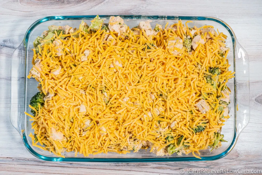 Covering Chicken Casserole with cheese