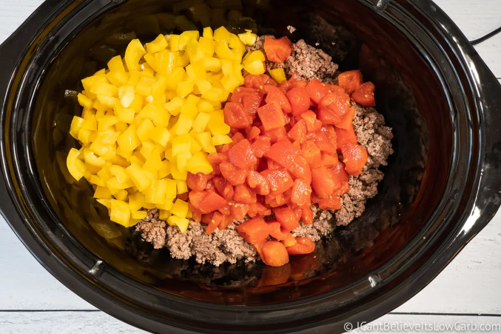 adding peppers to slow cooker