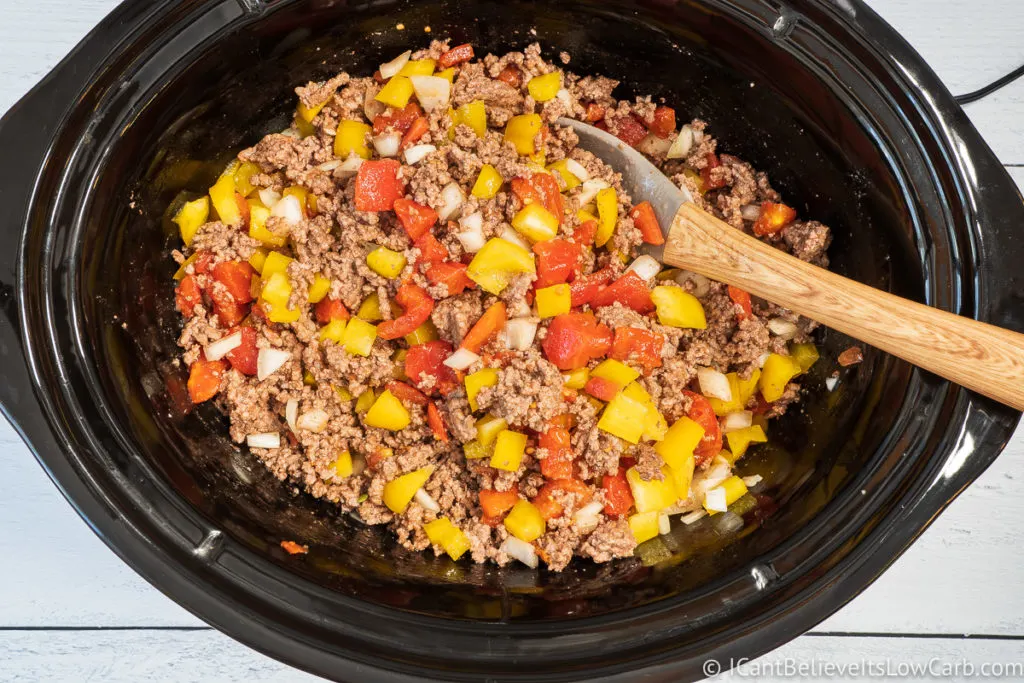 Mixing Keto Chili Ingredients in slow cooker