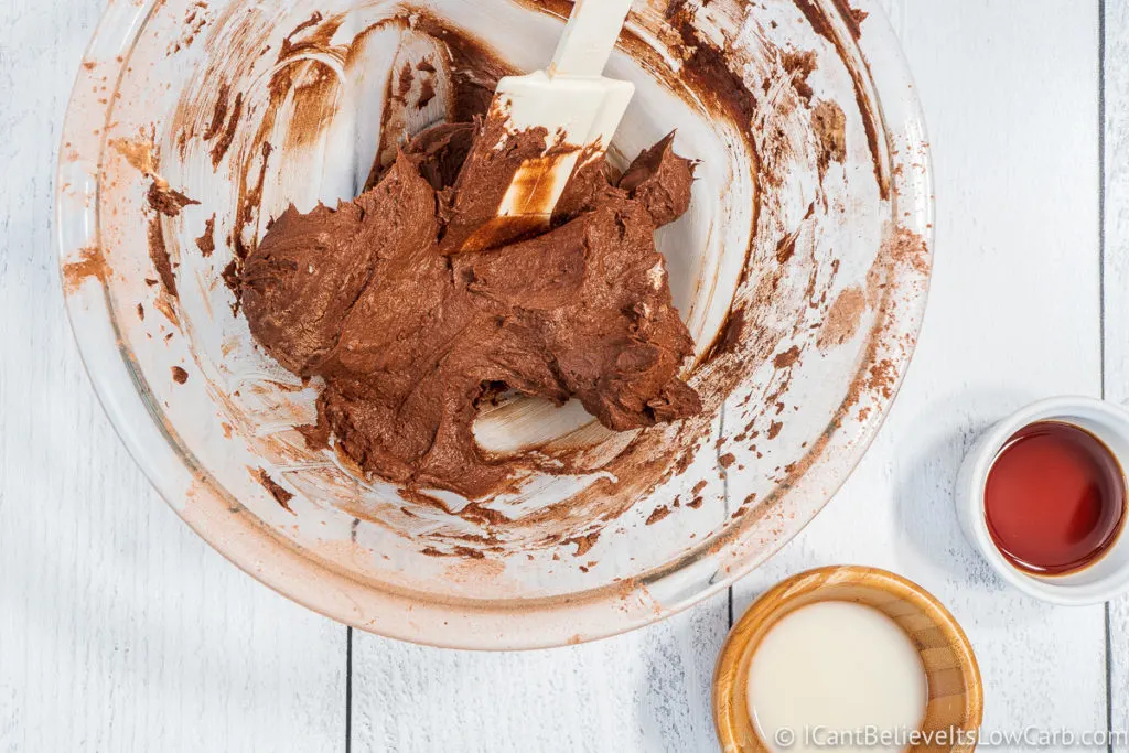 keto chocolate frosting mixed in bowl