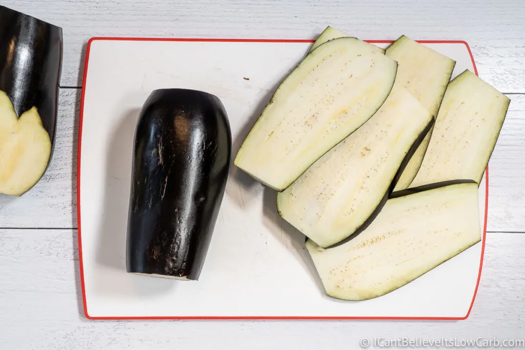 Eggplant sliced on cutting board