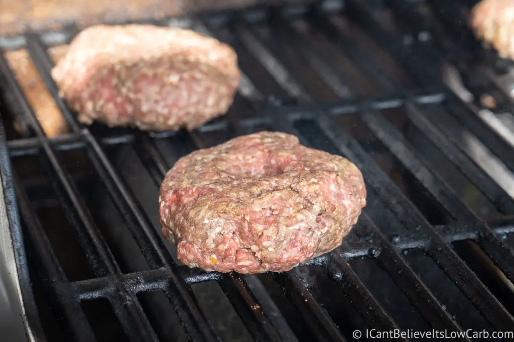 Cooking hamburger patties on the grill