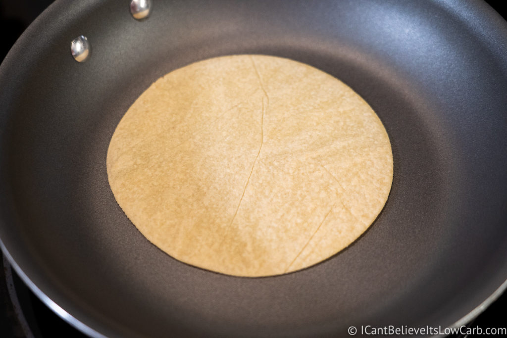 Keto Tortilla cooking in a pan