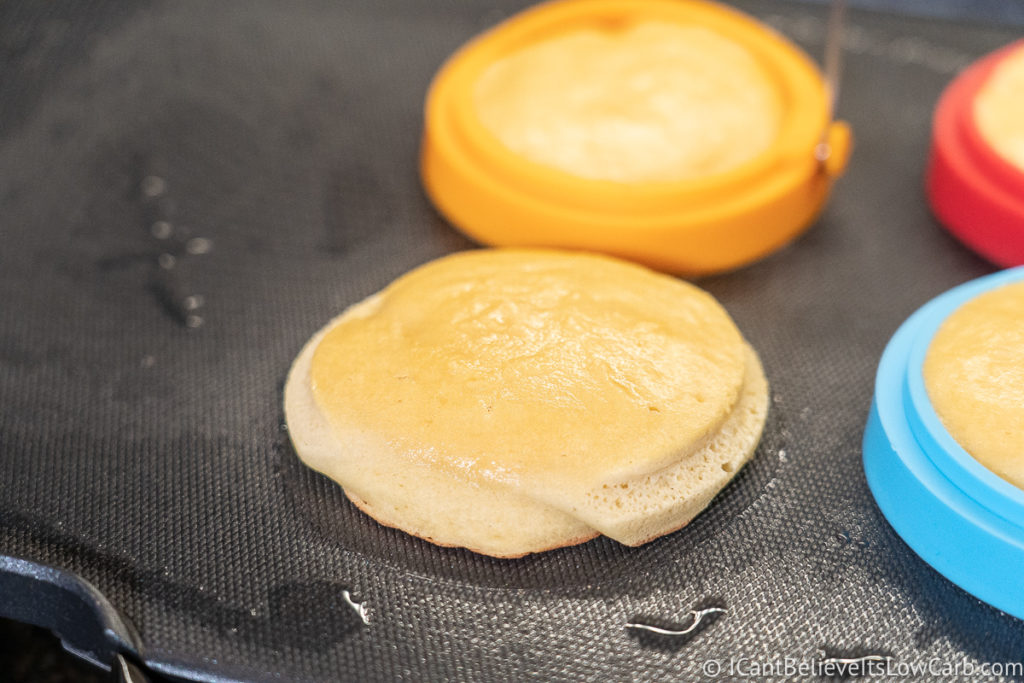 Cooking Keto Coconut Flour Pancakes on the stove