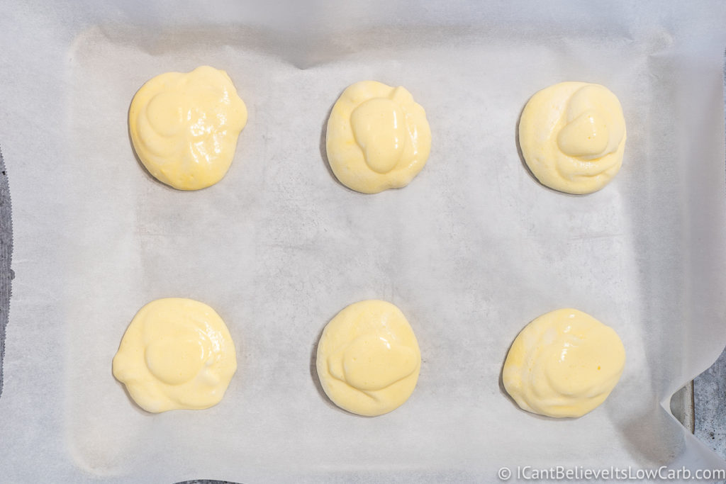 adding cloud bread mixture to baking tray