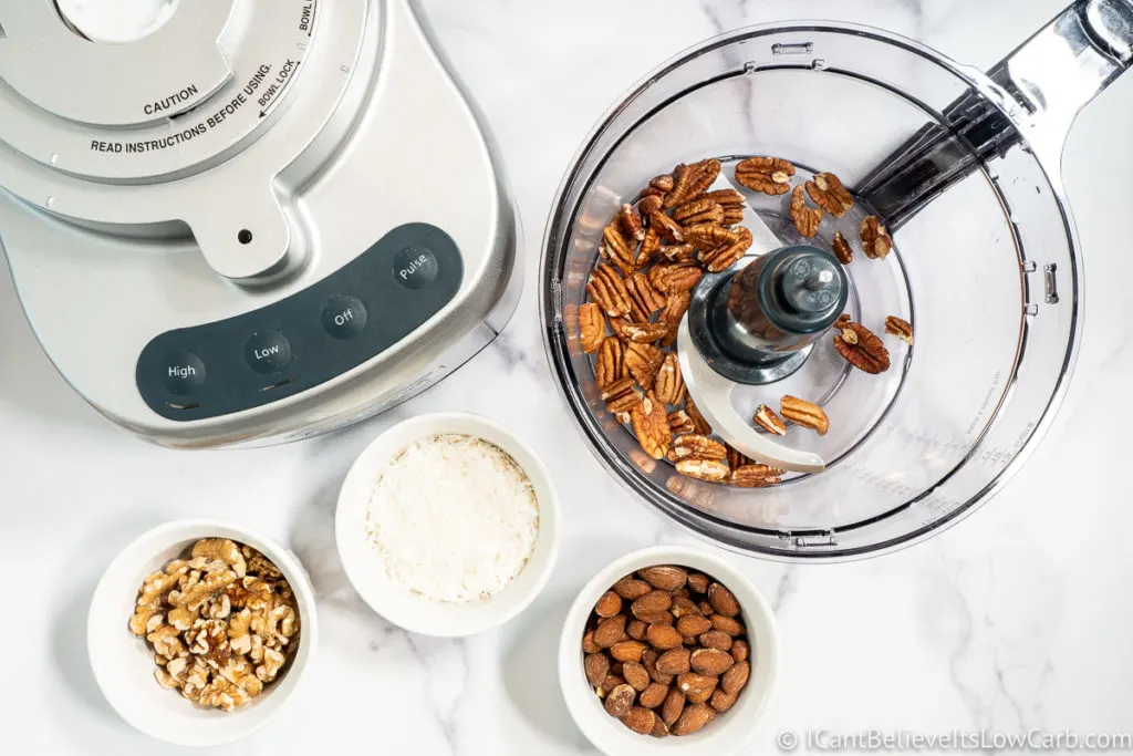 adding pecans to the blender