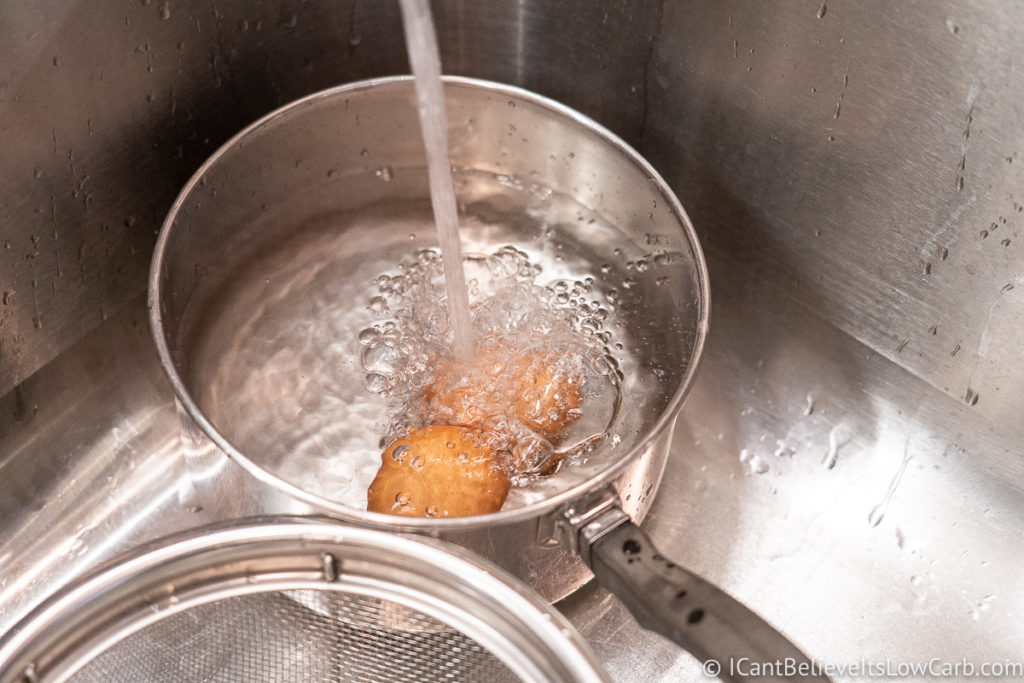 Running cold water over Boiled Eggs
