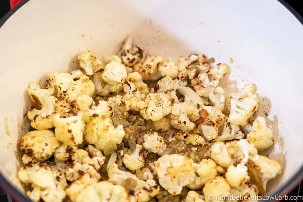 sautéing Cauliflower on a pan