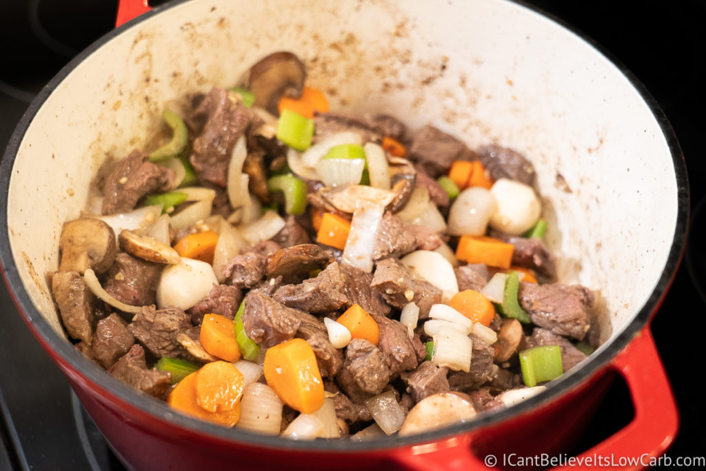 Cooking the beef and veggies together