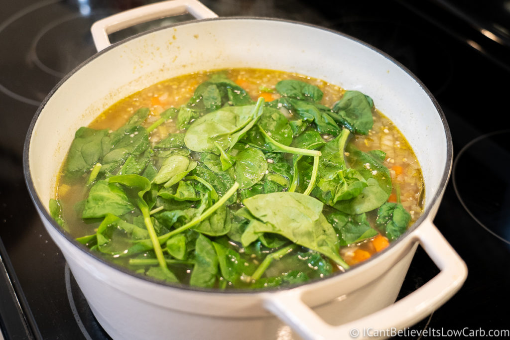 Adding spinach to the soup
