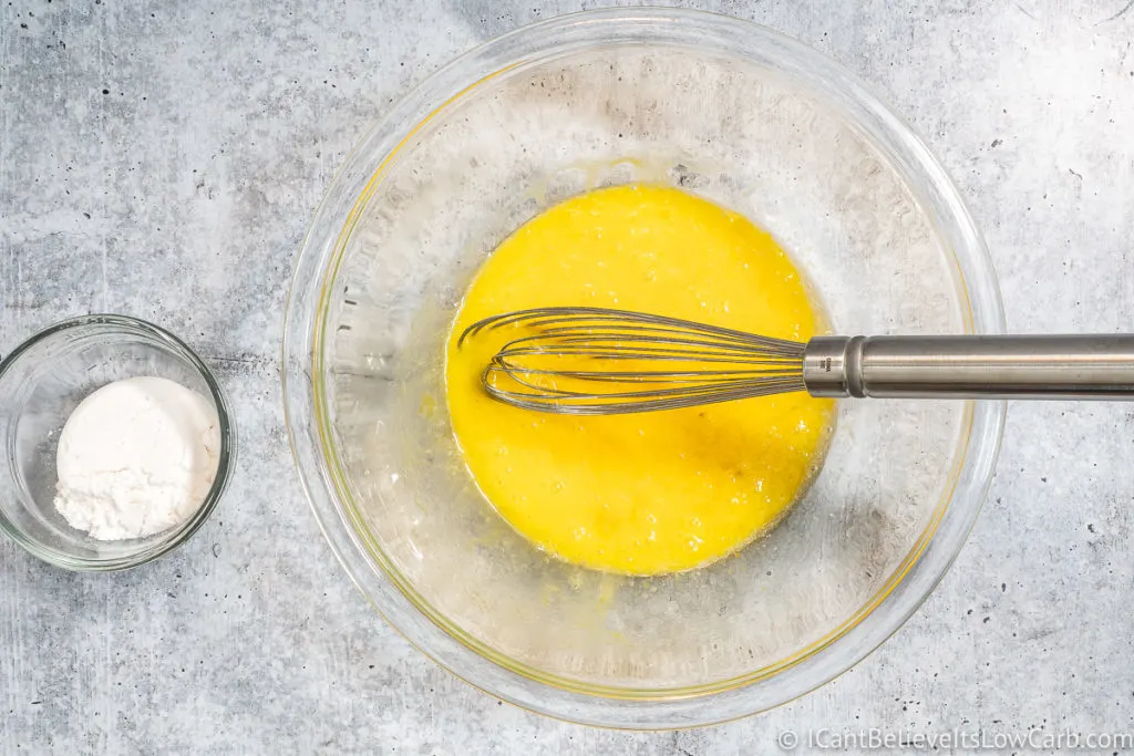 Mixing melted butter and eggs