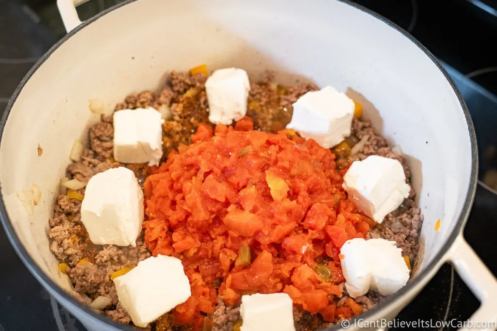 Adding cream cheese to the taco soup