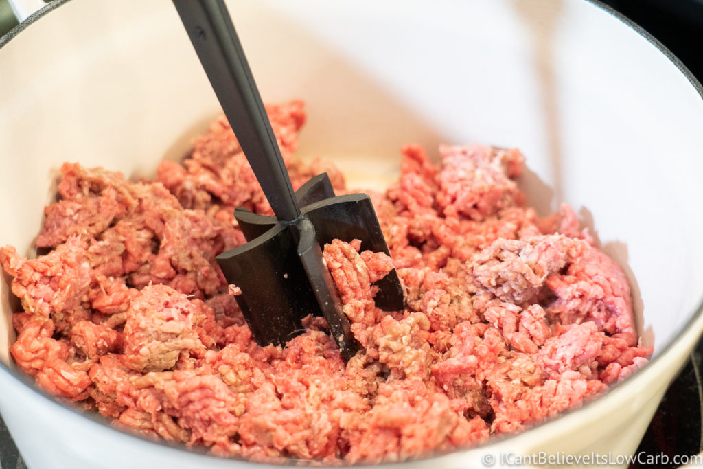 frying the ground beef on the stove