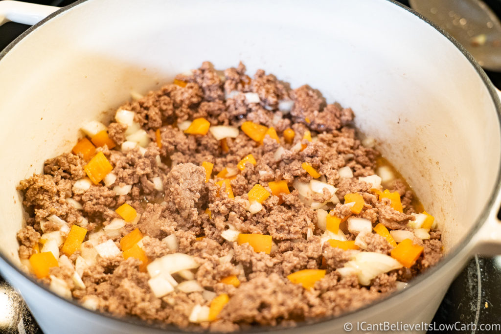 All ingredients cooking in a Dutch oven for Keto Taco Soup