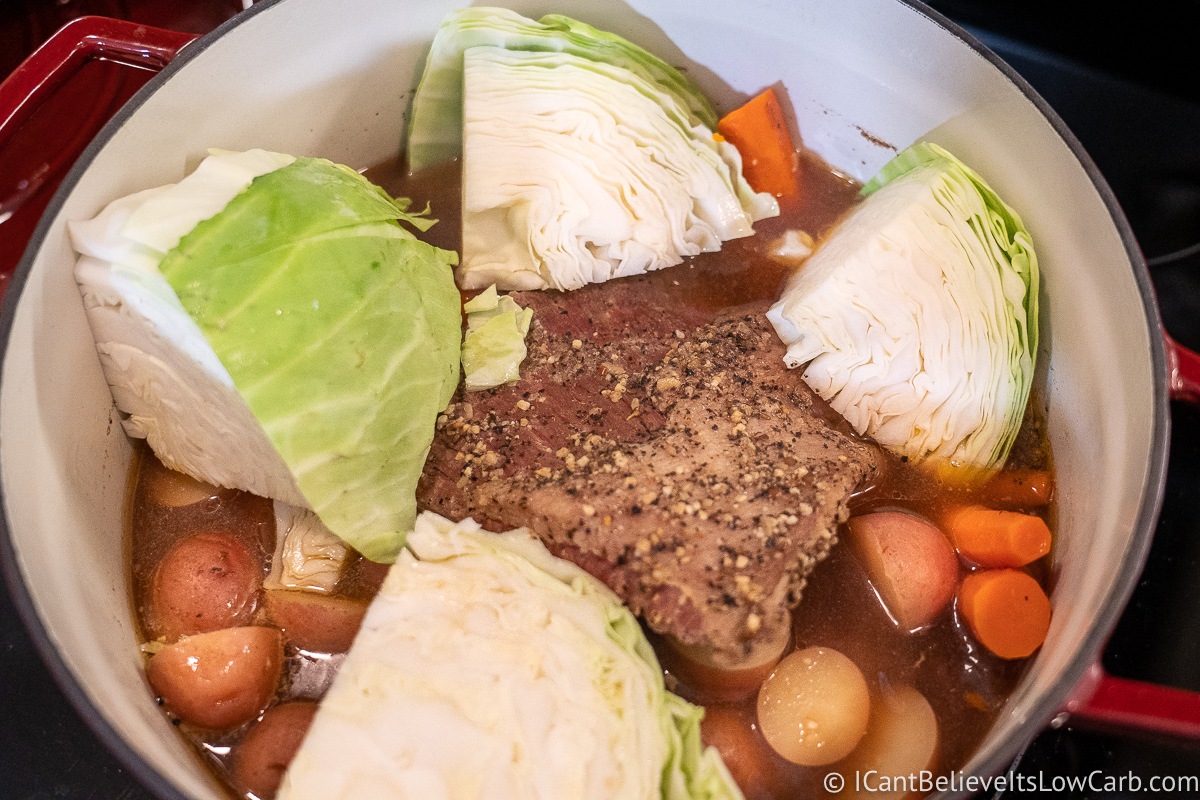 Adding cabbage to the Dutch Oven