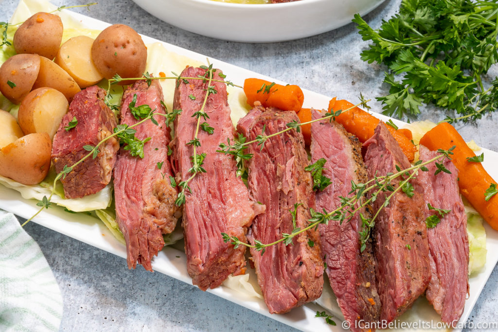 Corned Beef and Cabbage on a plate with carrots and potatoes