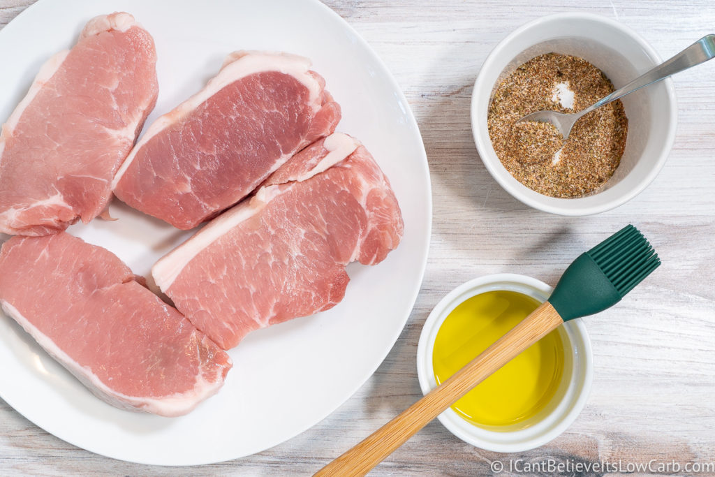 Pork Chops on a plate and other ingredients